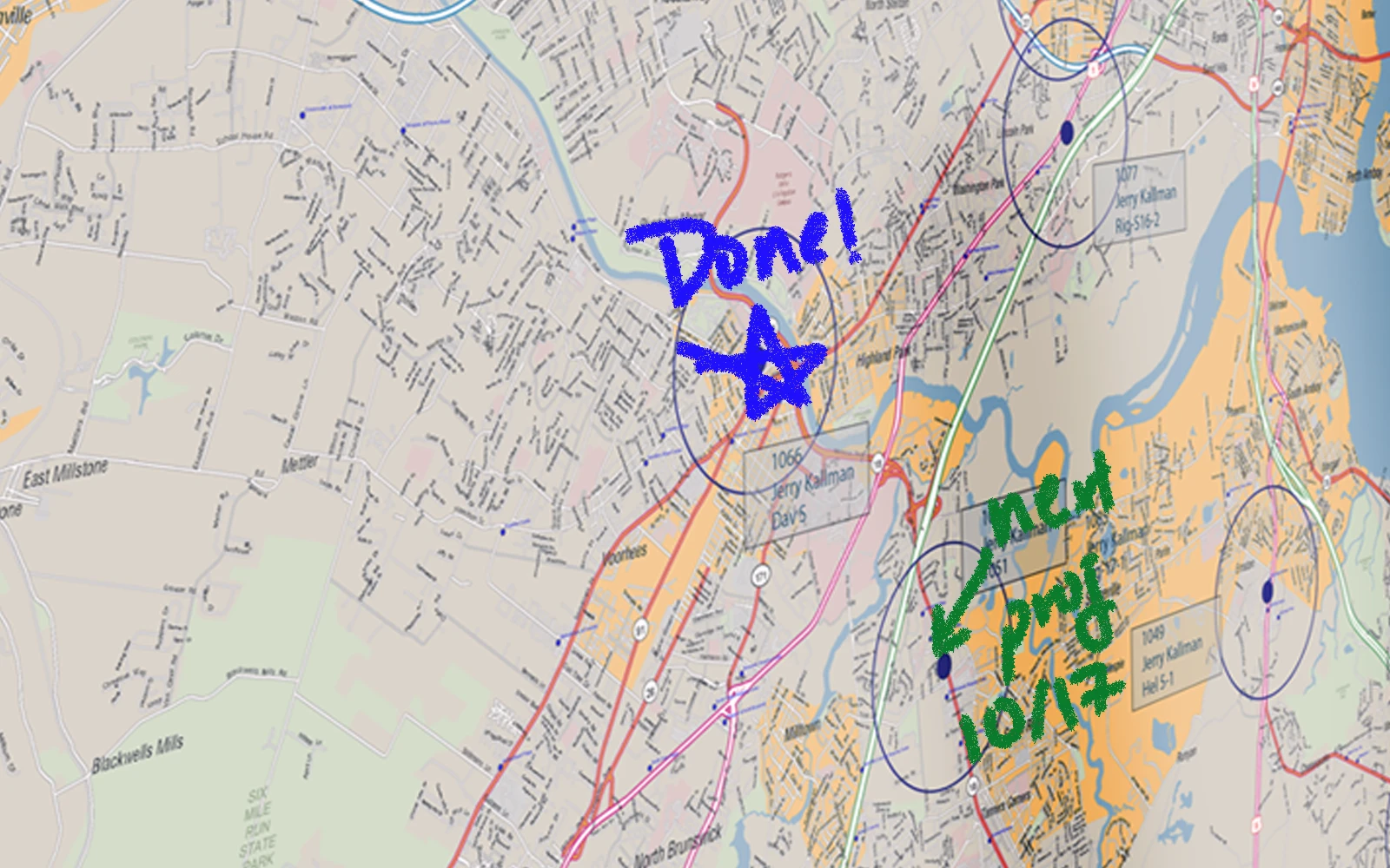 A map mural marked up in blue and green dry-erase marker
