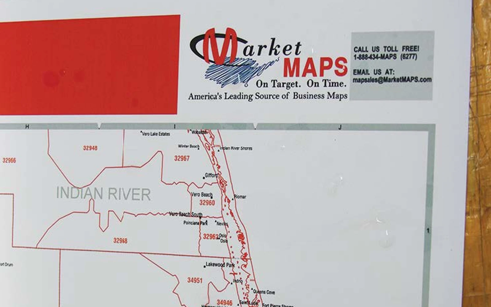 A synthetic paper map displayed flat on a board