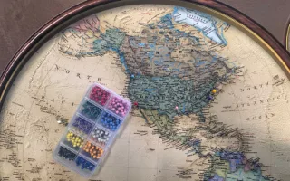 A map marked with a scatter of coloured push pins